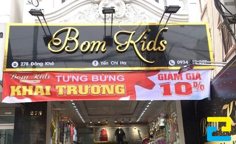 Mẫu băng rôn khai trương quần áo shop Bom Kids