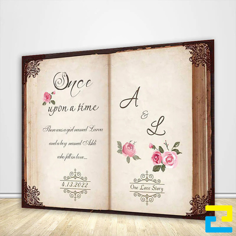 Mẫu 12: Backdrop lễ cưới được thiết kế viền lá với bố cục đẹp mắt, có kiểu chữ nghệ thuật - đơn giản, tông màu trắng chủ đạo