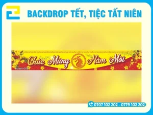 Mẫu 3: Backdrop tất niên có tông màu vàng - đỏ truyền thống