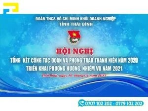Mẫu 15: Phông nền có hình nền trống đồng đẹp mắt, có tông màu xanh chủ đạo, được thiết kế đầy đủ những thông tin như: Tên hội nghị, tên đơn vị tổ chức hội nghị,…