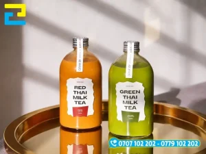 Decal PP chống nước in hình dán lên chai thủy tinh đựng đồ uống, trà sữa
