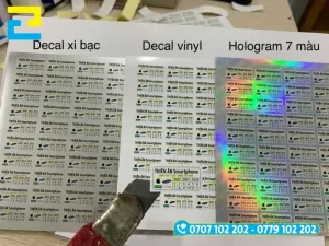 Ba loại chất liệu in tem bảo hành điện thoại phổ biến: decal xi bạc, decal vinyl tiêu chuẩn và decal hologram 7 màu