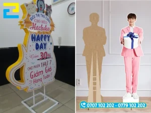 Mẫu standee 2 mặt dạng hộp, làm chân sắt, standee 3D hình người