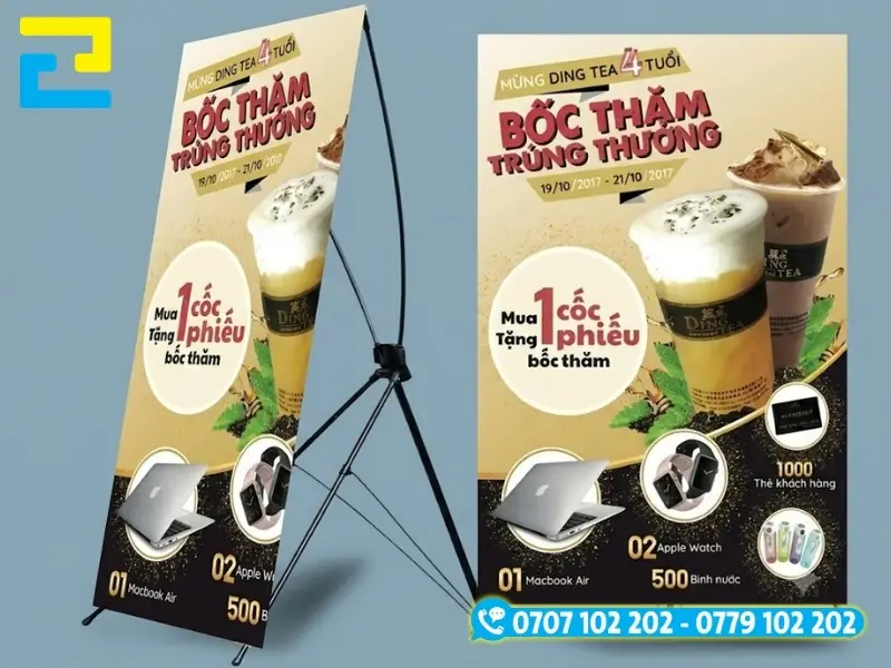 Mẫu Standee chữ X cho trà sữa chất liệu nhẹ phối hợp tấm in PP đóng khoen 4 góc đặt tại sảnh trong nhà