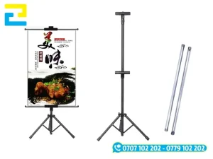 Chi tiết các bộ phận cấu tạo của standee chữ T gồm thân trụ, trục chỉnh độ cao, thanh kẹp và chân đế 3 chạc